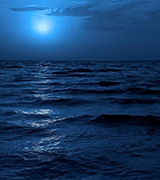 Moon over the ocean.