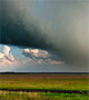 Rain over green fields