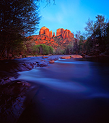 Desert rocks and blue stream.